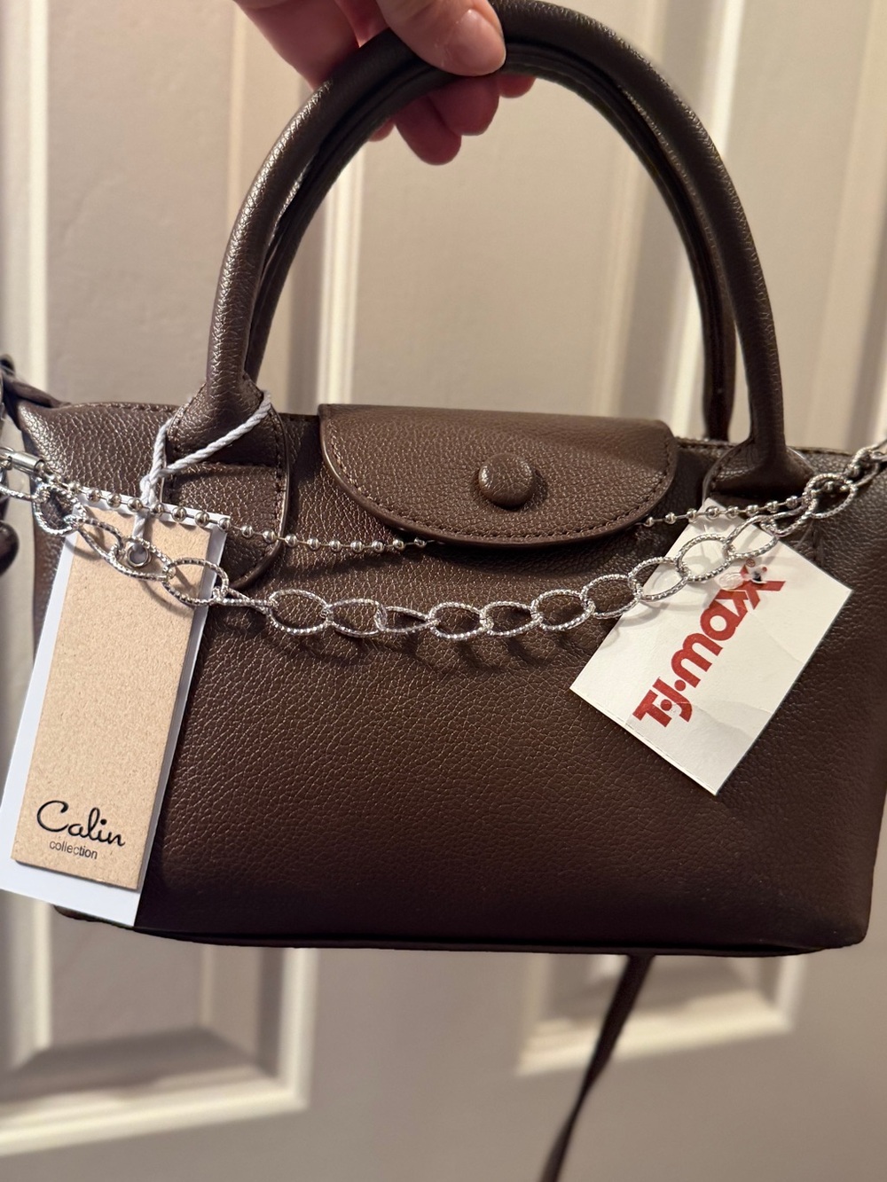 Brown Vegan Leather crossbody bag with silver bag chain.